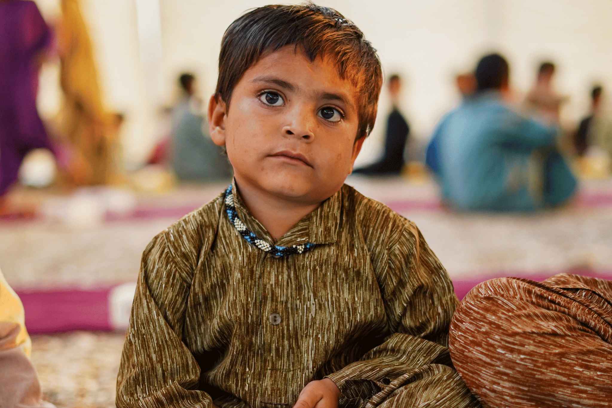 Iftar Distribution Sitting Child