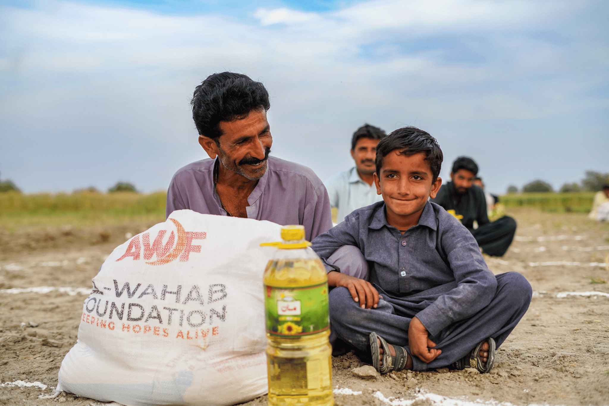 Ramadan Food Pack Distribution Afghanistan Man and Child